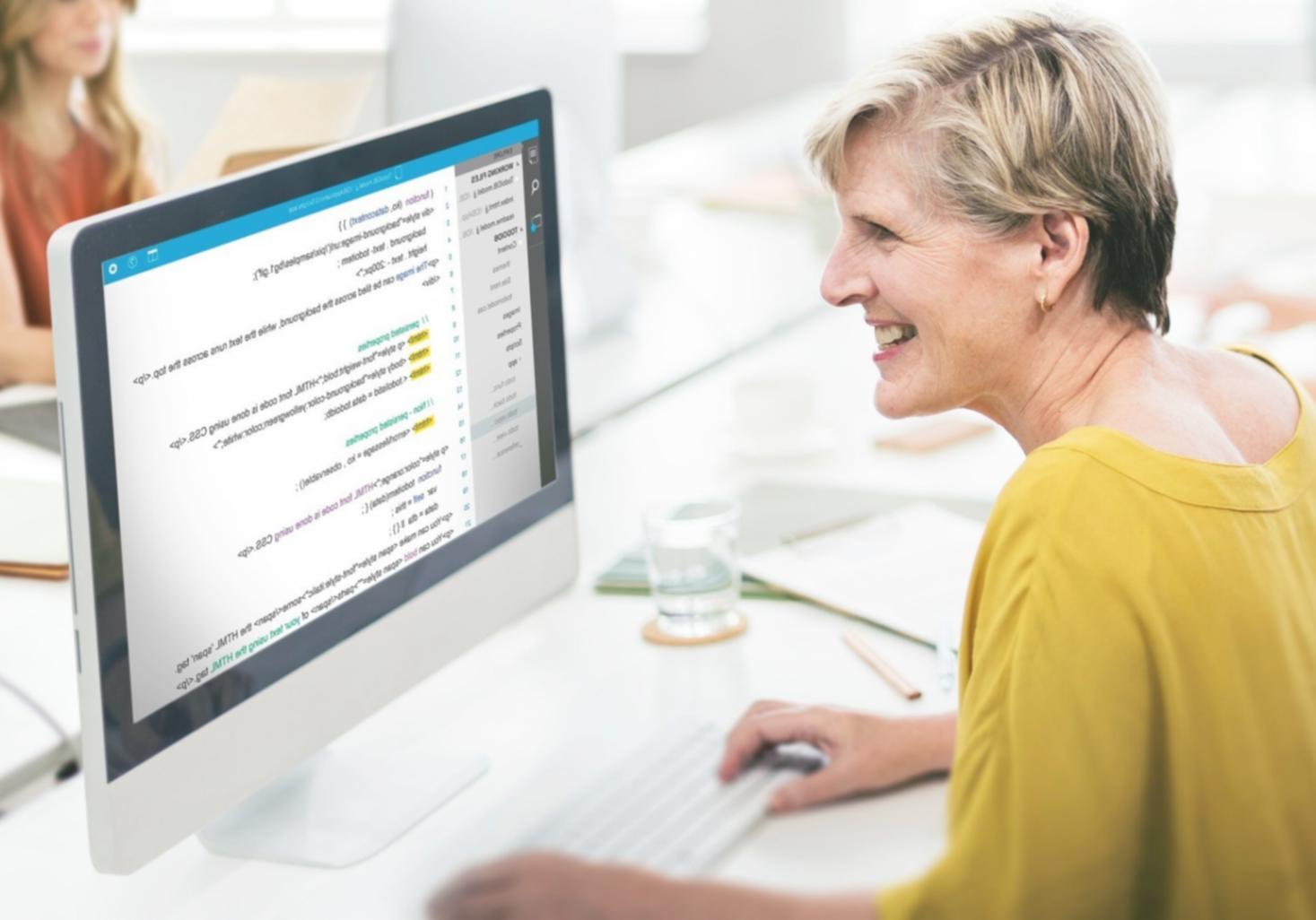 Advanced game development setup with VR equipment, multiple development boards, and professional coding environment