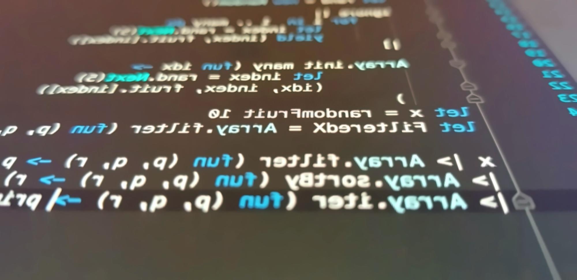 Students collaborating on game development project with code visible on screens